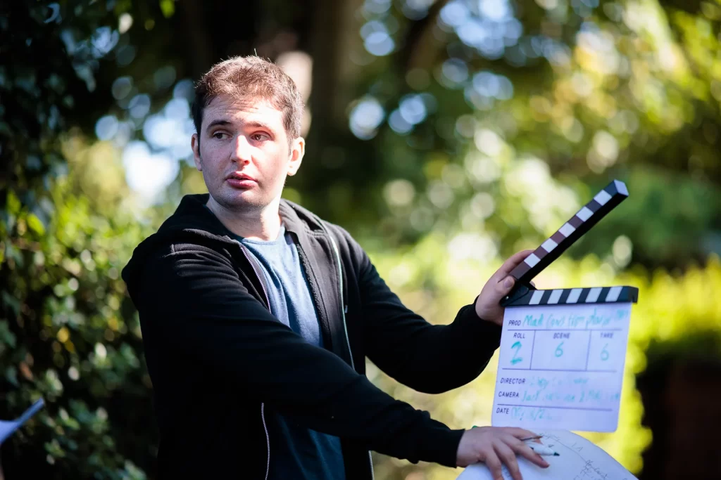 BTS Photography | Unit Stills Photographer Daniel Geesen | Jack McKenna claps the slate