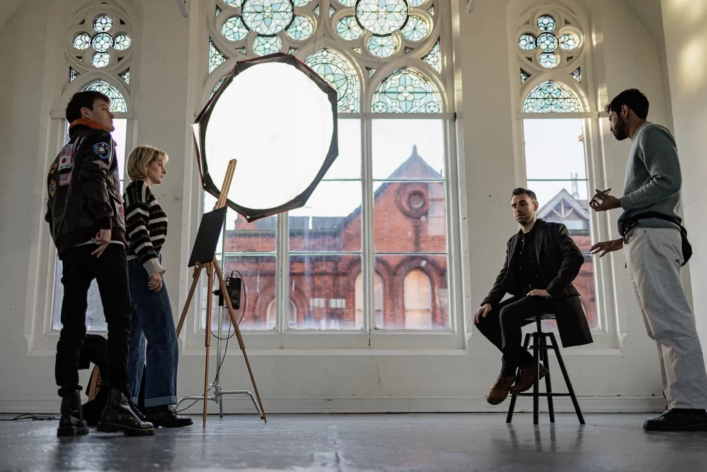 BTS Photograph Unit Stills Photography | "The Painter" | | Short Film Still by Daniel Geesen Unit Stills Photography | "The Painter" | wide shot featuring Thomas Burke, Áine Keaveney, Olkan, and Bornil Anurag | Short Film Still by Daniel Geesen