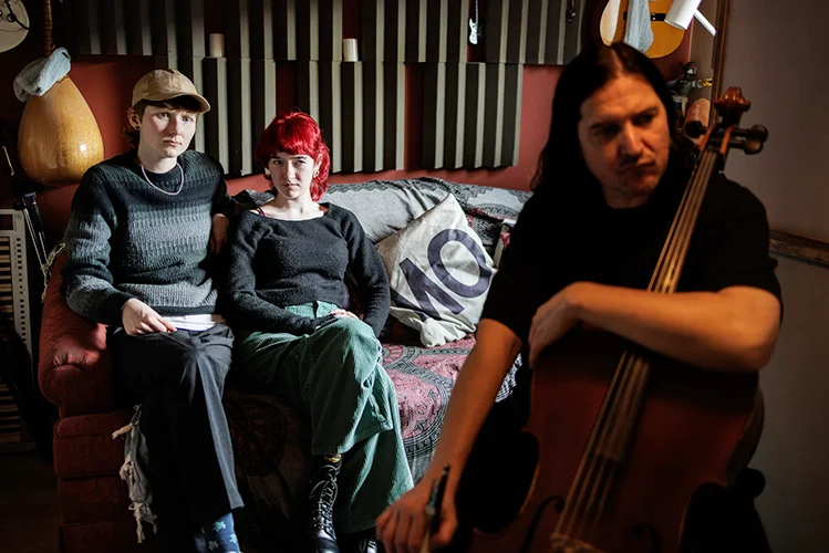 BTS of Directors Anika O'Hagan-Ploug and Aisling Wallace with Cellist Aongus MacAmlaigh reviewing sound in Graham Tully's studio for stop motion short "Kova's Courage"