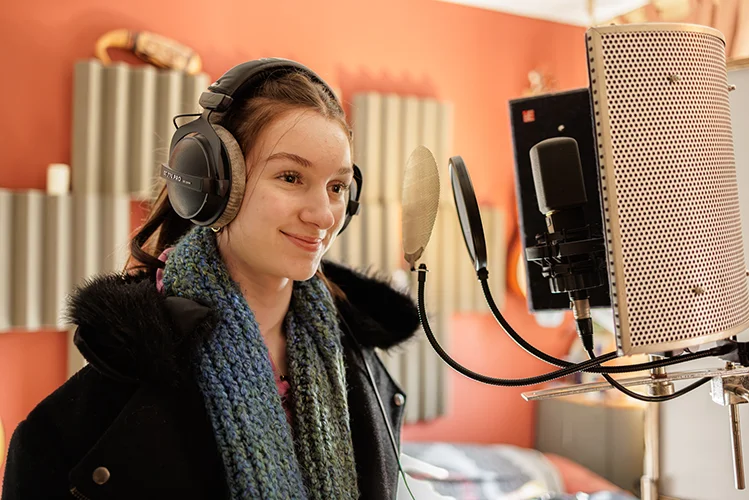 BTS of Eliza Rae Butler as "Kova" recording vocals for "Kova's Courage"