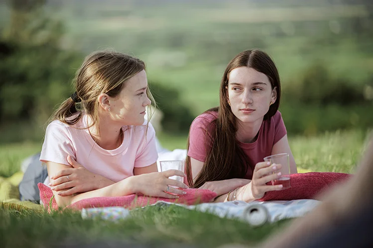 Unit Stills photo of Mae Higgins and Eliza Rae Butler on the set of "Field Queens"