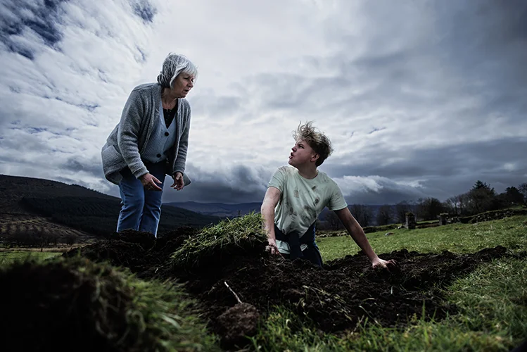 Janet Little as “Nessa” and Rowan Kummer as “Fionn” on the set of Tacit